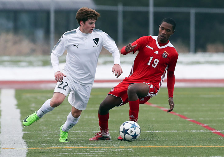 Players from Carleton, York battle for the ball.