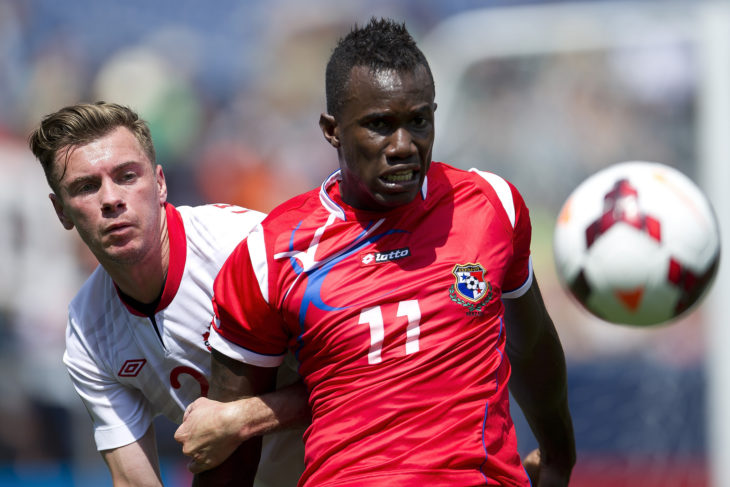 Nik Ledgerwood (L) battles with a Panamanian opponent. (Canada Soccer)