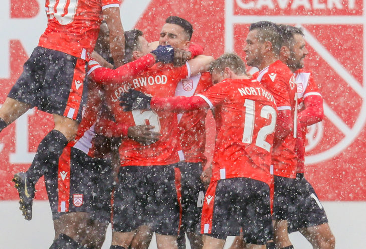 May 4, 2019; Foothills County, Alberta, Canada; Cavalry FC defender Dominick Zator (4) celebrate goal with teammates against the York9 FC during the second half during a Canadian Premier League soccer match at Spruce Meadows. Cavalry FC won 2-1. Mandatory Credit: Sergei Belski-USA TODAY Sports for CPL