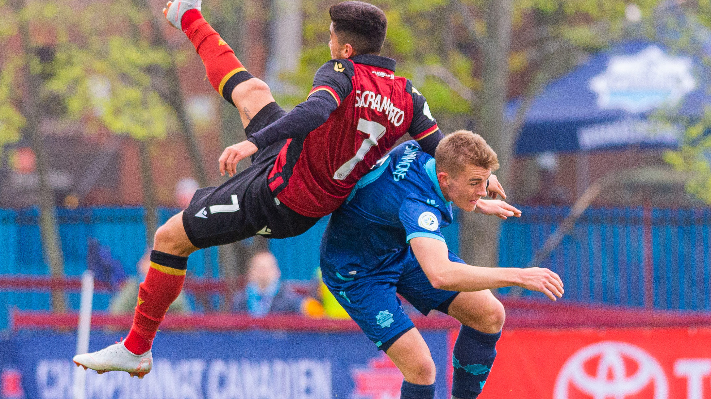 Valour FC's Dylan Sacramento and HFX Wanderers FC's Elliott Simmons collide in their Canadian Championship second round, first leg tilt. (Trevor MacMillan/CPL).