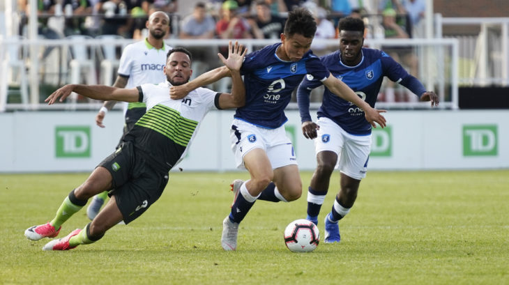 FC Edmonton defender Son Yongchan fends off York9 fullback Morey Doner. (CPL/Robert Marchese).