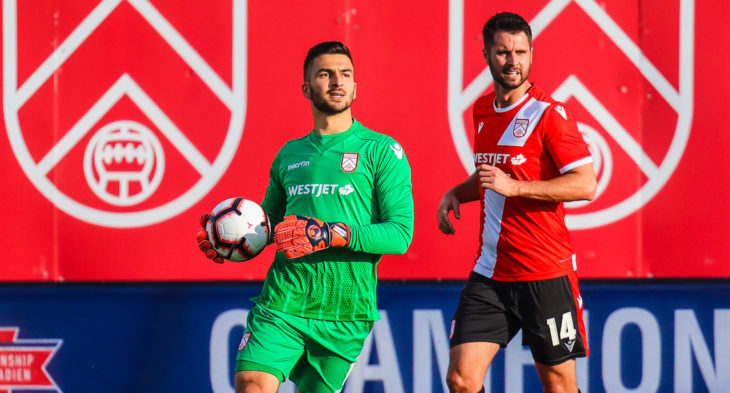 Cavalry FC goalkeeper Marco Carducci controls the ball against the Vancouver Whitecaps during the first half during a Canadian Championship soccer match at Spruce Meadows. (Photo: Sergei Belski-USA TODAY Sports for CPL).