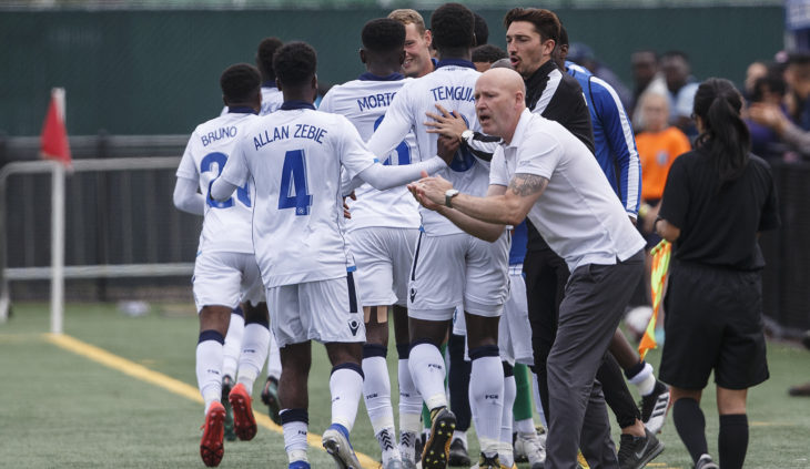 FC Edmonton head coach Jeff Paulus encourages his side after scoring a first-half goal against Pacific FC. (CPL/Jason Franson).