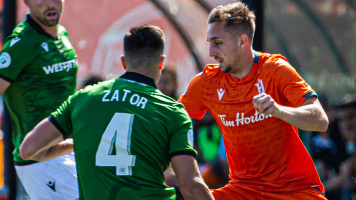 Cavalry defender Dominick Zator takes on Forge striker Marcel Zajac. (Photo: Ryan McCullough).