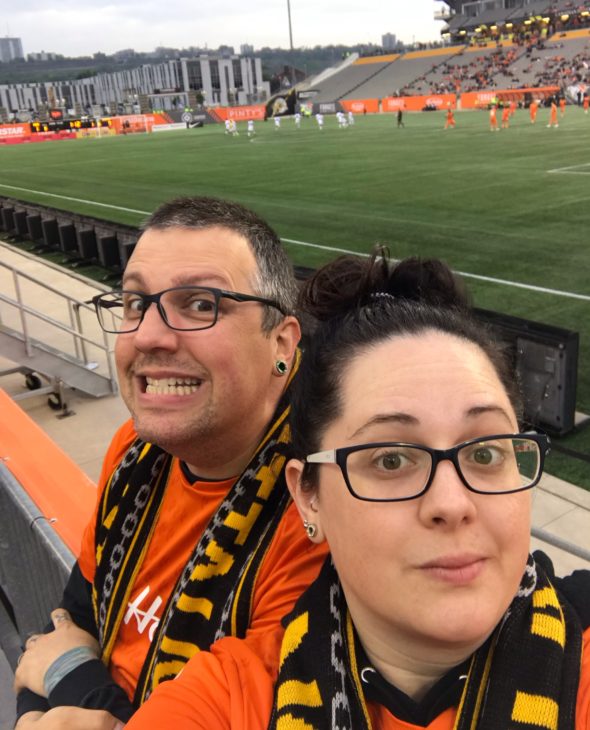 Stephanie and her husband Craig at a Forge FC home game. 