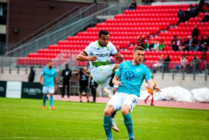 Rodrigo Gattas, left, in action for York9 FC. (Photo: Casey Wolfgang)