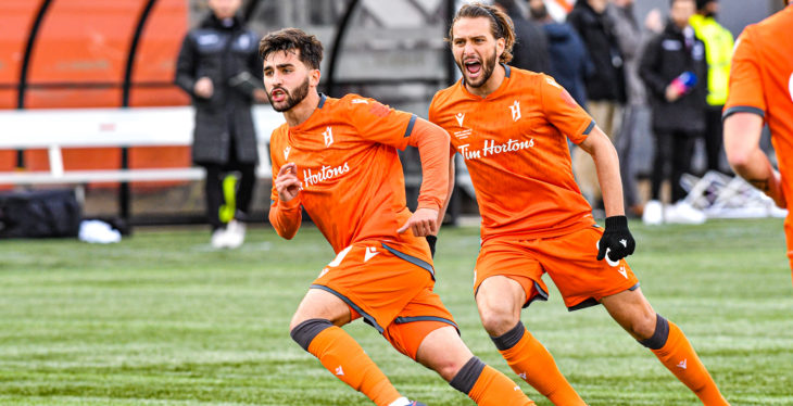 Forge FC's Tristan Borges, left, celebrates scoring against Cavalry FC. (CPL)