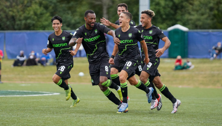 Many Aparicio (no. 10) celebrates with his York9 FC teammates after scoring against HFX Wanderers FC. (CPL/Chant Photography)