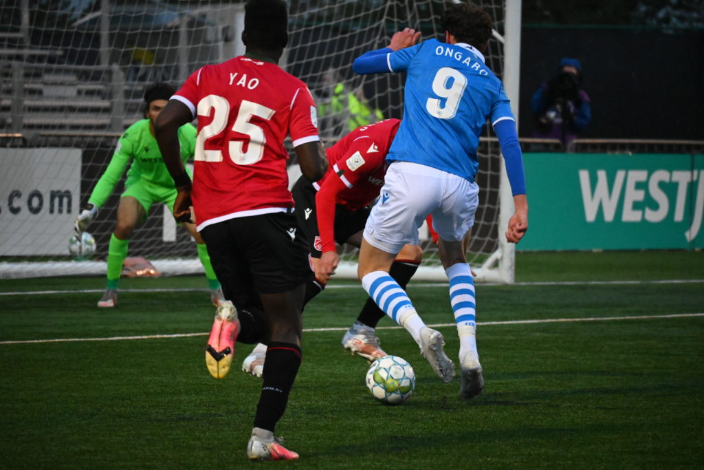 FC Edmonton forward Easton Ongaro tries to play through the Cavalry defence. (FC Edmonton)