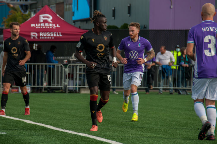 William Akio of Valour FC (center) scored in the second half. (Photo: Pacific FC)