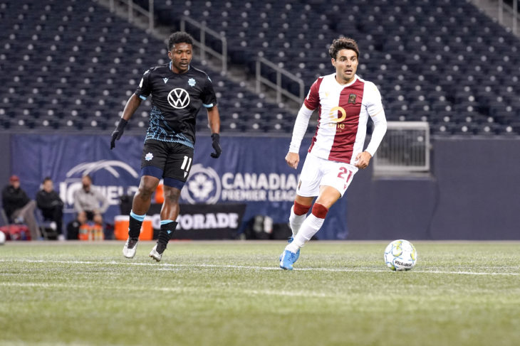 Akeem Garcia of HFX Wanderers (left) and José Galán of Valour FC battle for the ball. (Robert Reyes Ong / Valour FC)