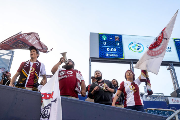 July 7, 2021. York United FC vs Valour FC. Pre-Game. Valour FC fans cheer and sing in the stands.