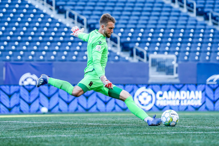 June 30, 2021. Valour FC vs. HFX Wanderers FC. Second-Half. Goalkeeper Jonathan Sirois puts the ball in play.